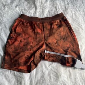 Lululemon orange and black shorts with a tie dye design #shorts